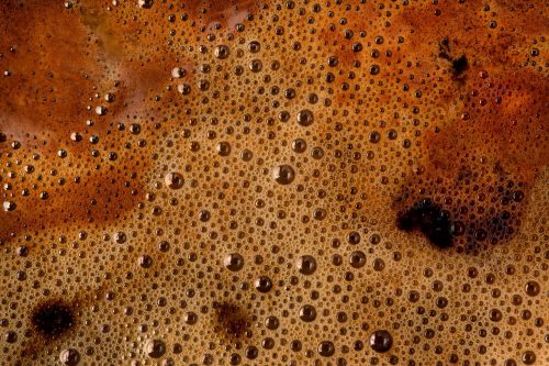 Coffee foam extreme close up.